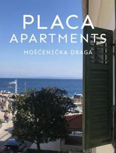 ein Schild mit den plaza apartments mosaccariazonazona in der Unterkunft Placa Apartments in Mošćenička Draga