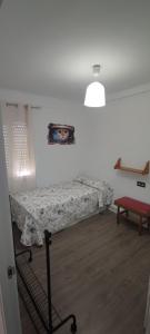 Postel nebo postele na pokoji v ubytování Apartamento Rema