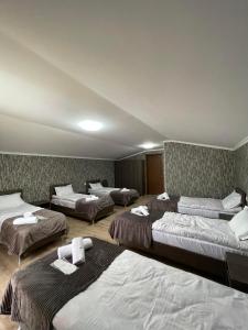 Rúm í herbergi á Hotel Shina