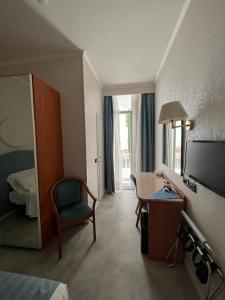Ein Bett oder Betten in einem Zimmer der Unterkunft Hotel Excelsior Bay