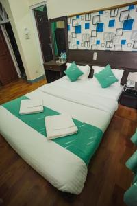 Llit o llits en una habitació de Himalayan Guest House