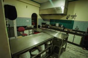 Cuina o zona de cuina de Himalayan Guest House