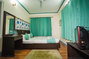 Llit o llits en una habitació de Himalayan Guest House