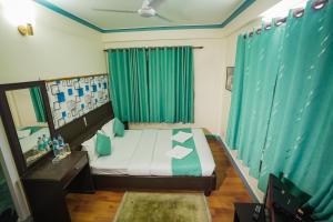 Llit o llits en una habitació de Himalayan Guest House