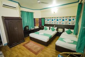 Llit o llits en una habitació de Himalayan Guest House