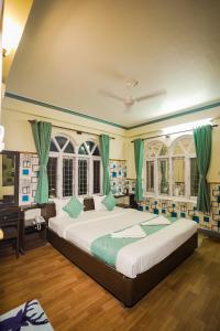 Llit o llits en una habitació de Himalayan Guest House