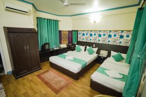 Llit o llits en una habitació de Himalayan Guest House