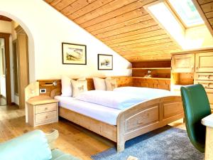 Posteľ alebo postele v izbe v ubytovaní Chalet Bernardi Apartments