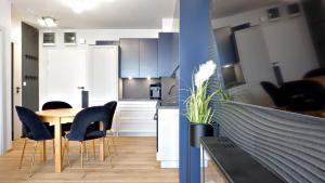 Η κουζίνα ή μικρή κουζίνα στο Posesja Kapitańska Oli&Joly