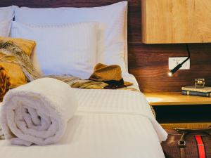 Postel nebo postele na pokoji v ubytování Residence ǁ Corino