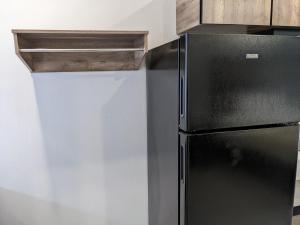 Kuchyň nebo kuchyňský kout v ubytování Captain Suites