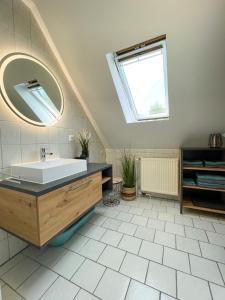 Bathroom sa Ferienwohnung Ostfrieslandliebe