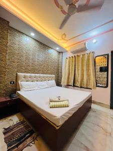 Ένα ή περισσότερα κρεβάτια σε δωμάτιο στο The Bella Guesthouse