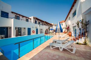 Бассейн в Iliana Hotel или поблизости
