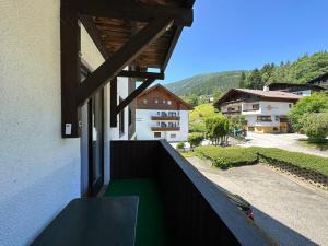 a balcony of a building with a view of a street at Studio Apartment BKK in Bad Kleinkirchheim