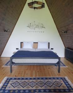 En eller flere senge i et værelse på Cottage GarShemo Kazbegi
