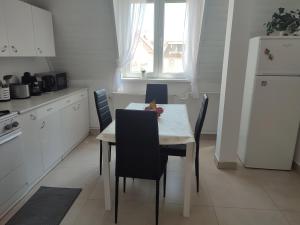 Kuchyň nebo kuchyňský kout v ubytování Veronika Rooms