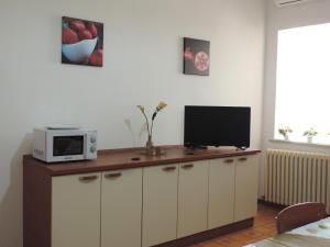 TV a/nebo společenská místnost v ubytování "Babbo" Nicola