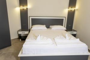 Postel nebo postele na pokoji v ubytování Pera Side Hotel