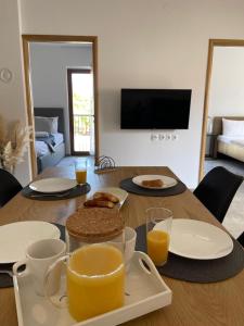 TV a/nebo společenská místnost v ubytování Apartmani Komin