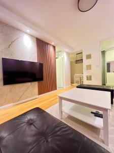 TV a/nebo společenská místnost v ubytování Apartment Hana