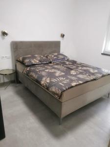 a bed in a room with at Lunisa VS1 Apartment in Kostrena