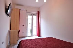 Postel nebo postele na pokoji v ubytování B&B Ospedale Pescara