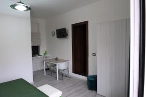 TV a/nebo společenská místnost v ubytování B&B Ospedale Pescara