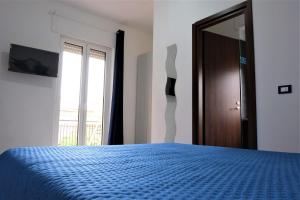 Postel nebo postele na pokoji v ubytování B&B Ospedale Pescara