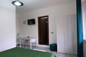TV a/nebo společenská místnost v ubytování B&B Ospedale Pescara