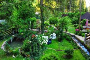 an aerial view of a garden with a pond at Weekend house Grahovača in Rožaje +10 photos