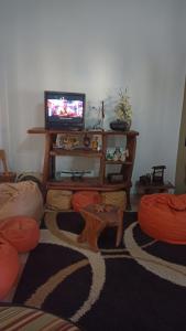 Televiisor ja/või meelelahutuskeskus majutusasutuses CASA DE CAMPO A TOCA