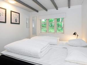 Postel nebo postele na pokoji v ubytování Holiday home Glesborg CXXXV
