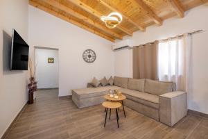 TV a/nebo společenská místnost v ubytování Casa di Gianna