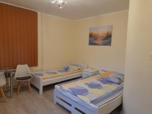 Cama o camas de una habitación en Zajazd Morfeusz