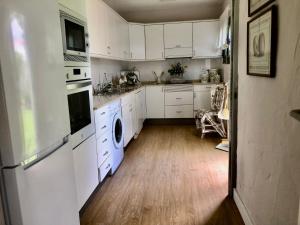 Kuchyň nebo kuchyňský kout v ubytování Santa Clara Bungalows