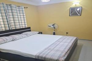 Voodi või voodid majutusasutuse A Stunning 3 Bedroom Apartment in Okitipupa -6 ppl toas