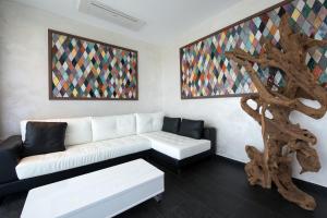Posezení v ubytování Suites Natura Mas Tapiolas + 37 fotografií