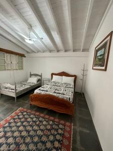 Ένα ή περισσότερα κρεβάτια σε δωμάτιο στο VILLA ARATOCA +12 φωτογραφίες