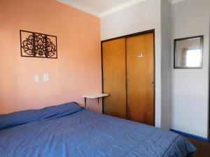Postel nebo postele na pokoji v ubytování HOSTEL ARRAYAN BARILOCHE