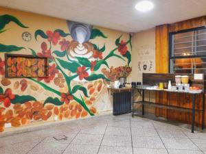 Kuchyň nebo kuchyňský kout v ubytování HOSTEL ARRAYAN BARILOCHE