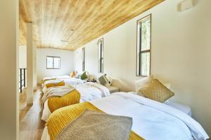 Postel nebo postele na pokoji v ubytování GLAMPING GATE 奈良