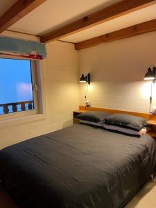 Ένα ή περισσότερα κρεβάτια σε δωμάτιο στο Mount Buller Apartment