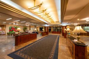 a lobby of a hotel with a reception area at Hotel Symphony Sagae Onsen in Sagae