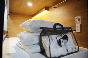 Postel nebo postele na pokoji v ubytování AMANGO HOSTEL