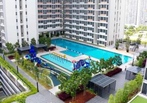 an overhead view of a swimming pool in a city at Horizon Suites near KLIA Free Wi-Fi Netflix (green) in Sepang