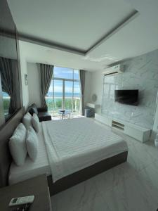 Ένα ή περισσότερα κρεβάτια σε δωμάτιο στο Ocean Vista Sea Links Mũi Né - Apartment 1,2&3 br