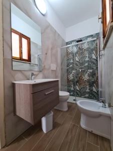 Koupelna v ubytování casa al mare kalispera + 37 fotografií