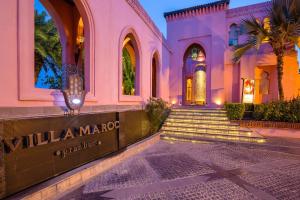 a building with a sign that reads villa marquez at Villa Maroc Resort in Pran Buri +143 photos