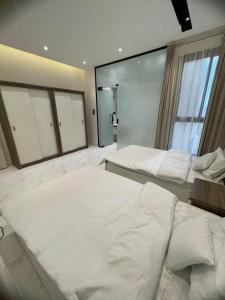 Un pat sau paturi într-o cameră la The Best Villa